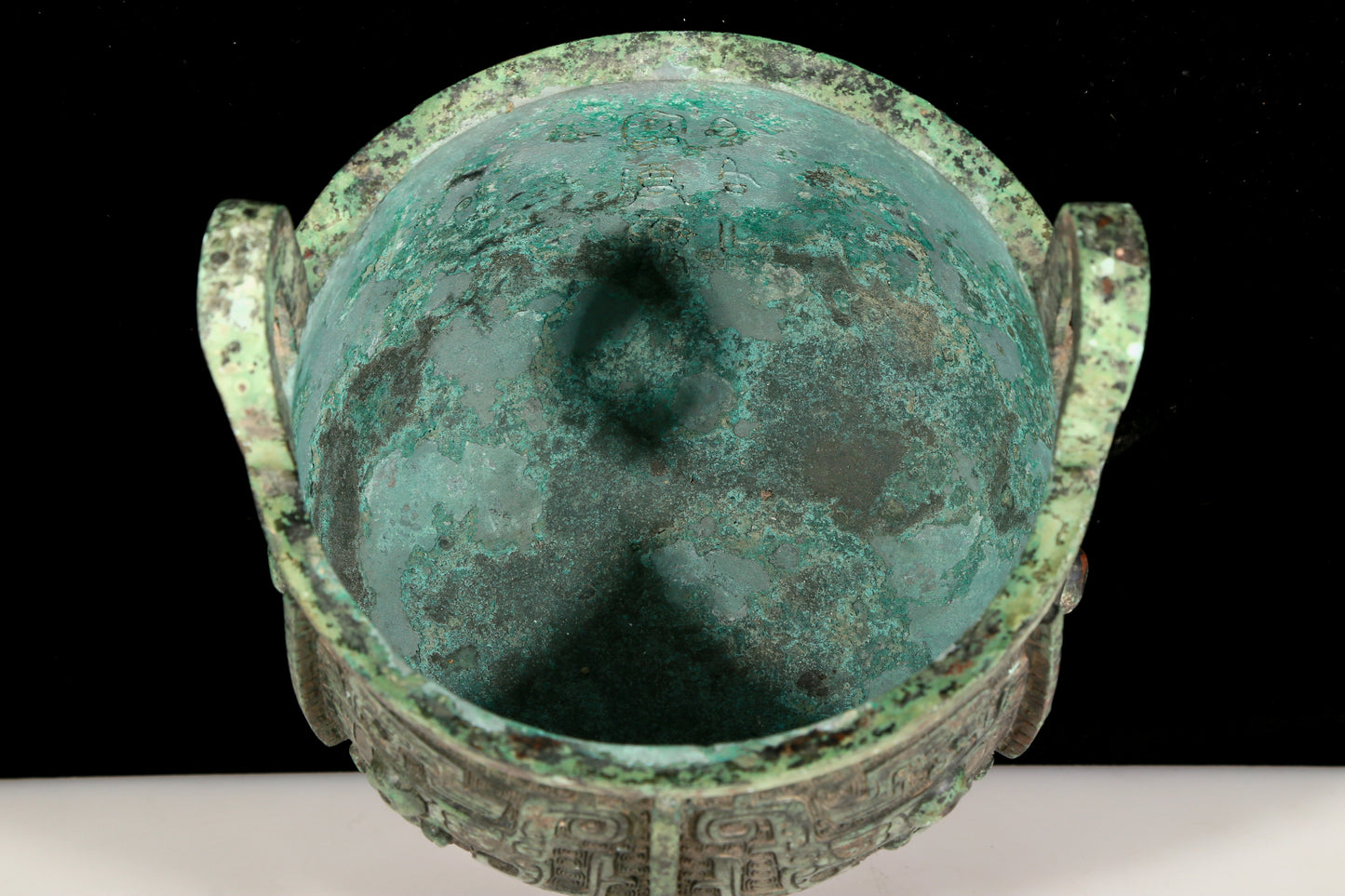 A precious bronze animal-faced two-eared and tripod censer