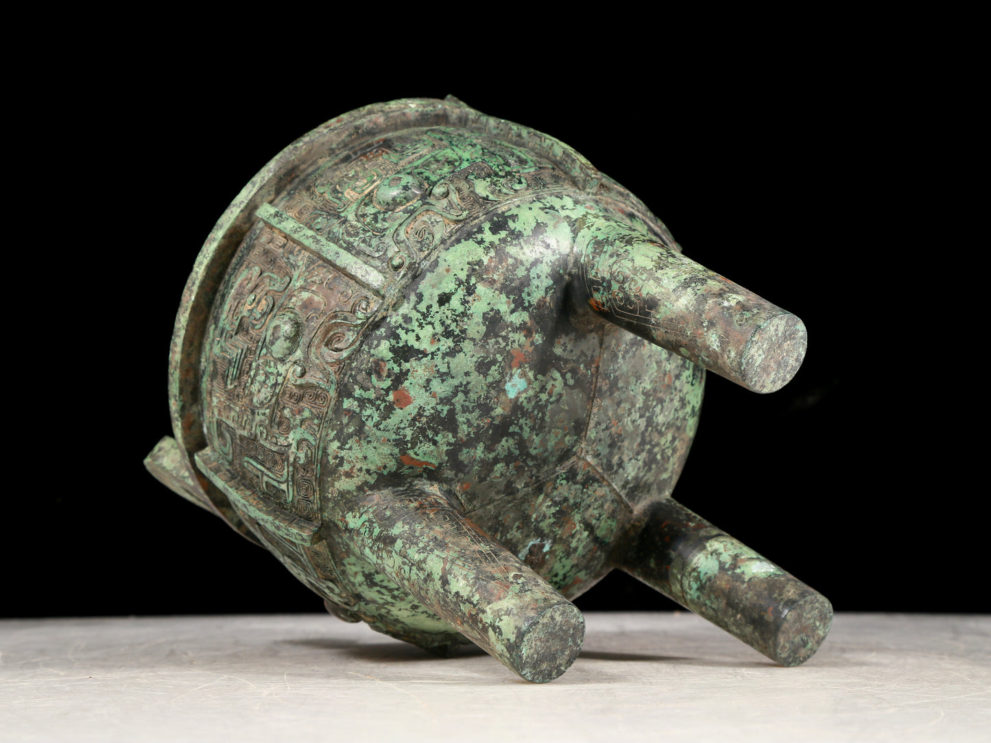 A precious bronze animal-faced two-eared and tripod censer