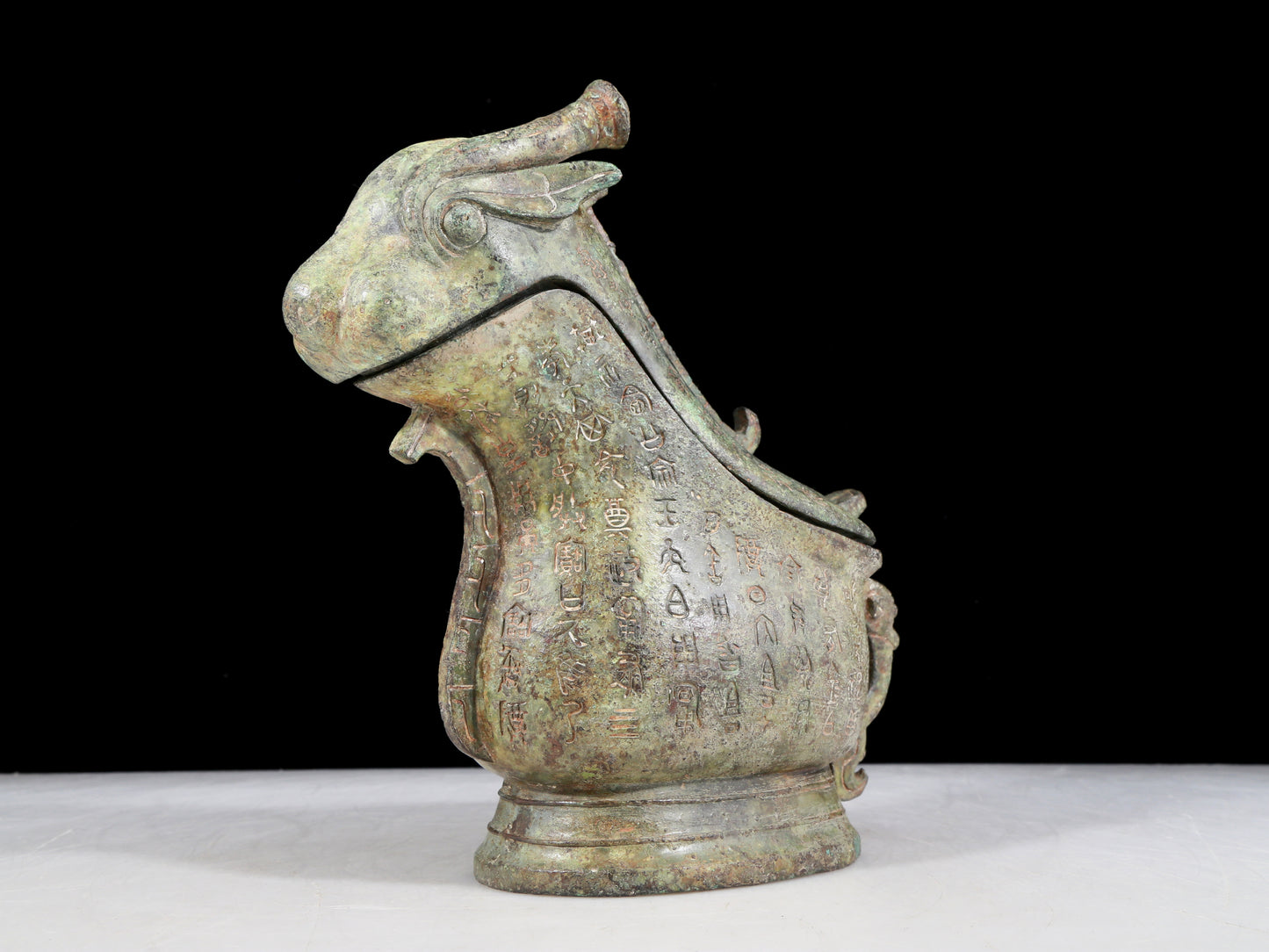 A precious bronze ewer with auspicious animal patterns