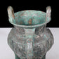 A precious bronze tripod pot with animal masks