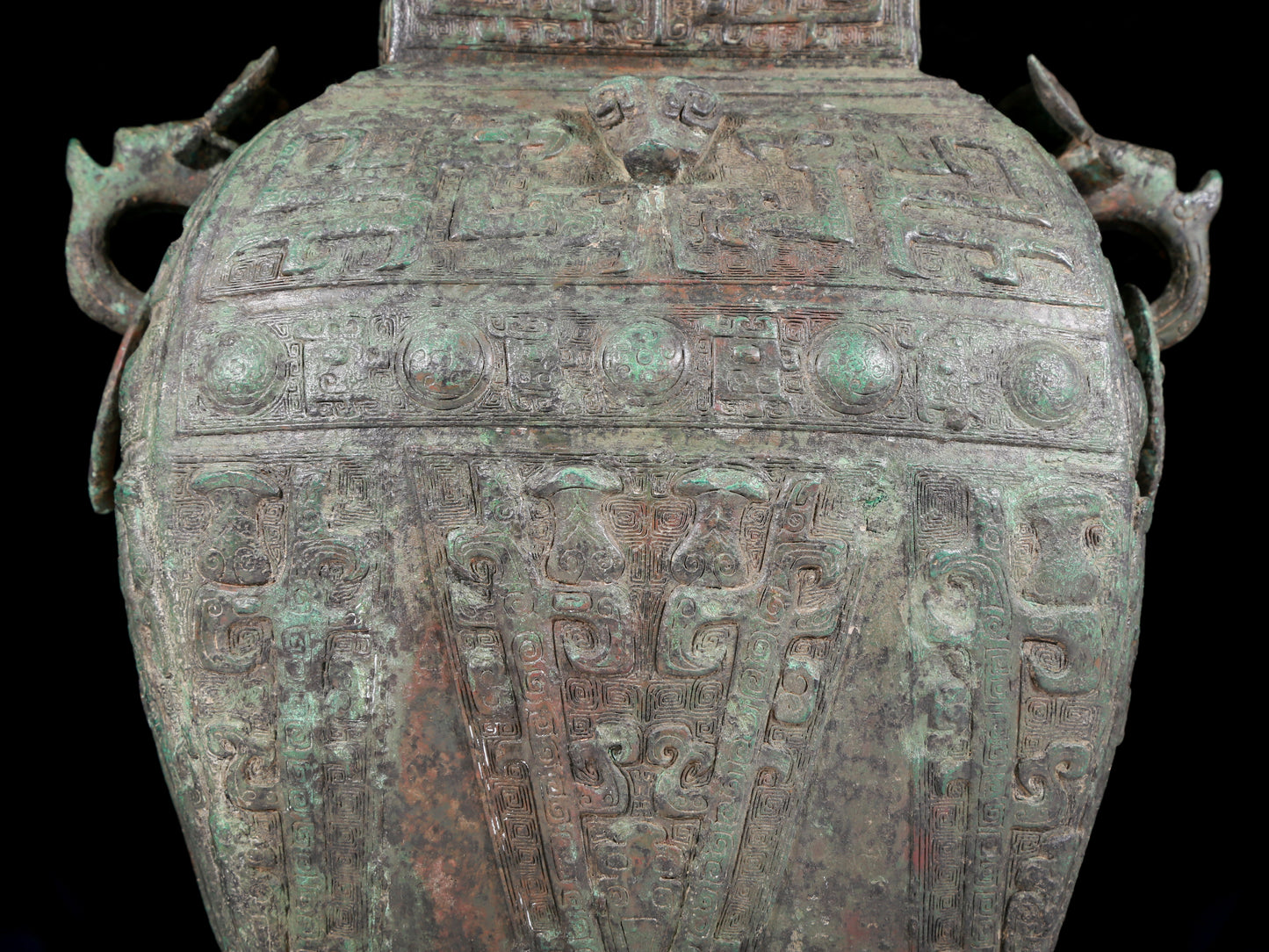 A rare bronze animal-faced amphora with lid