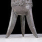 A precious bronze tripod cup with animal masks