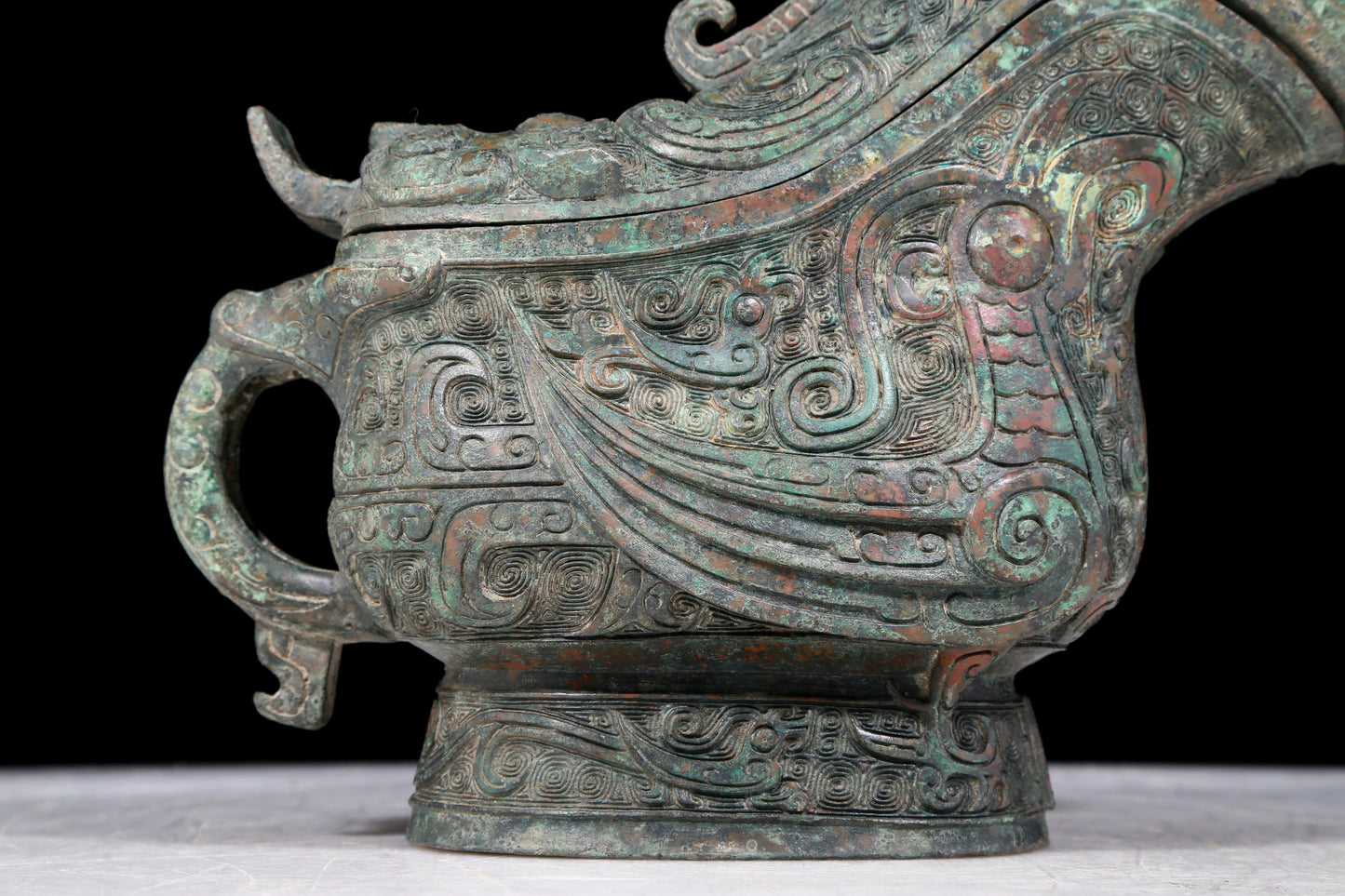 A precious bronze ewer with auspicious animal patterns