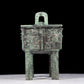 A precious bronze animal-faced tripod with two ears and four legs