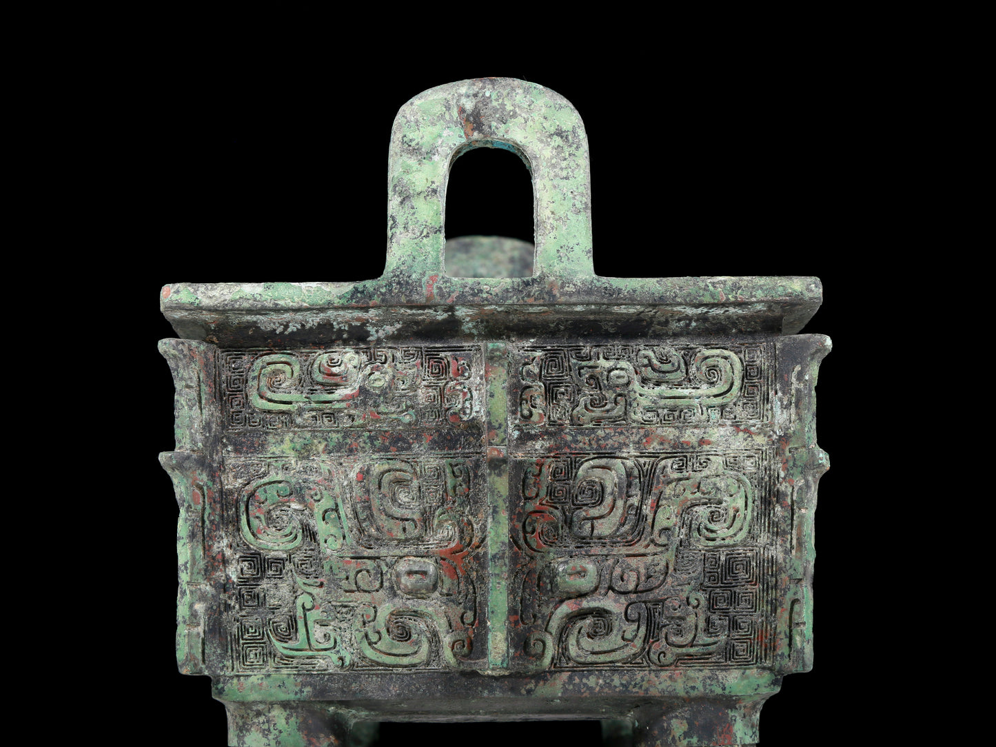 A precious bronze animal-faced tripod with two ears and four legs