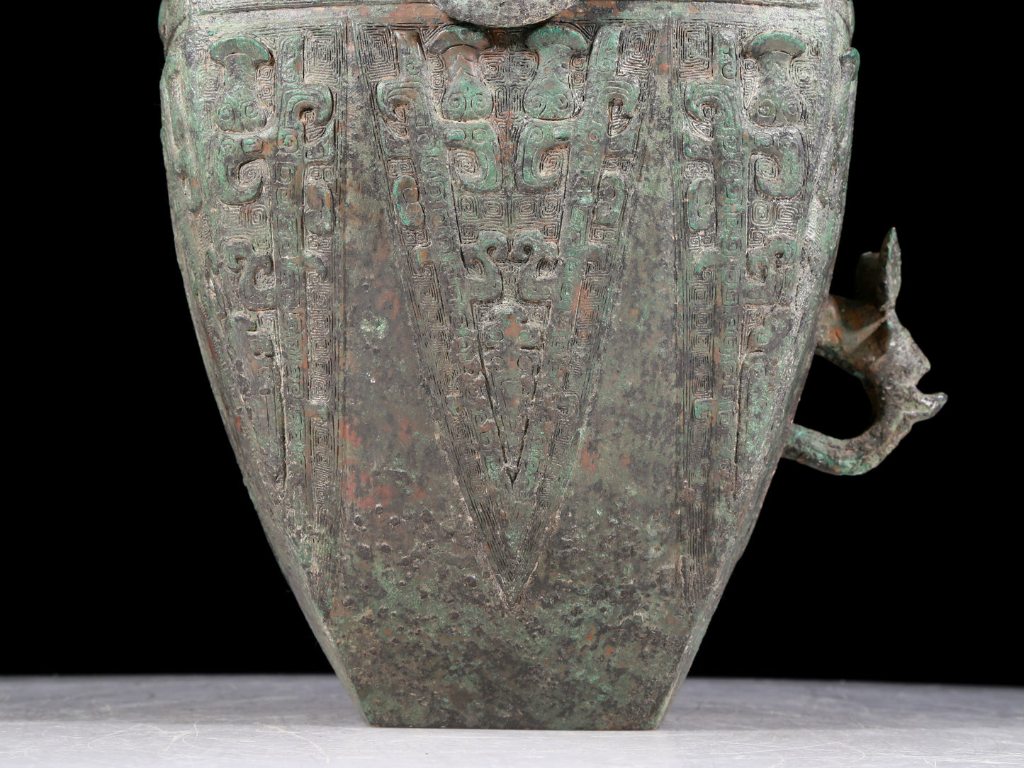 A rare bronze animal-faced amphora with lid