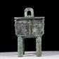 A precious bronze animal-faced tripod with two ears and four legs