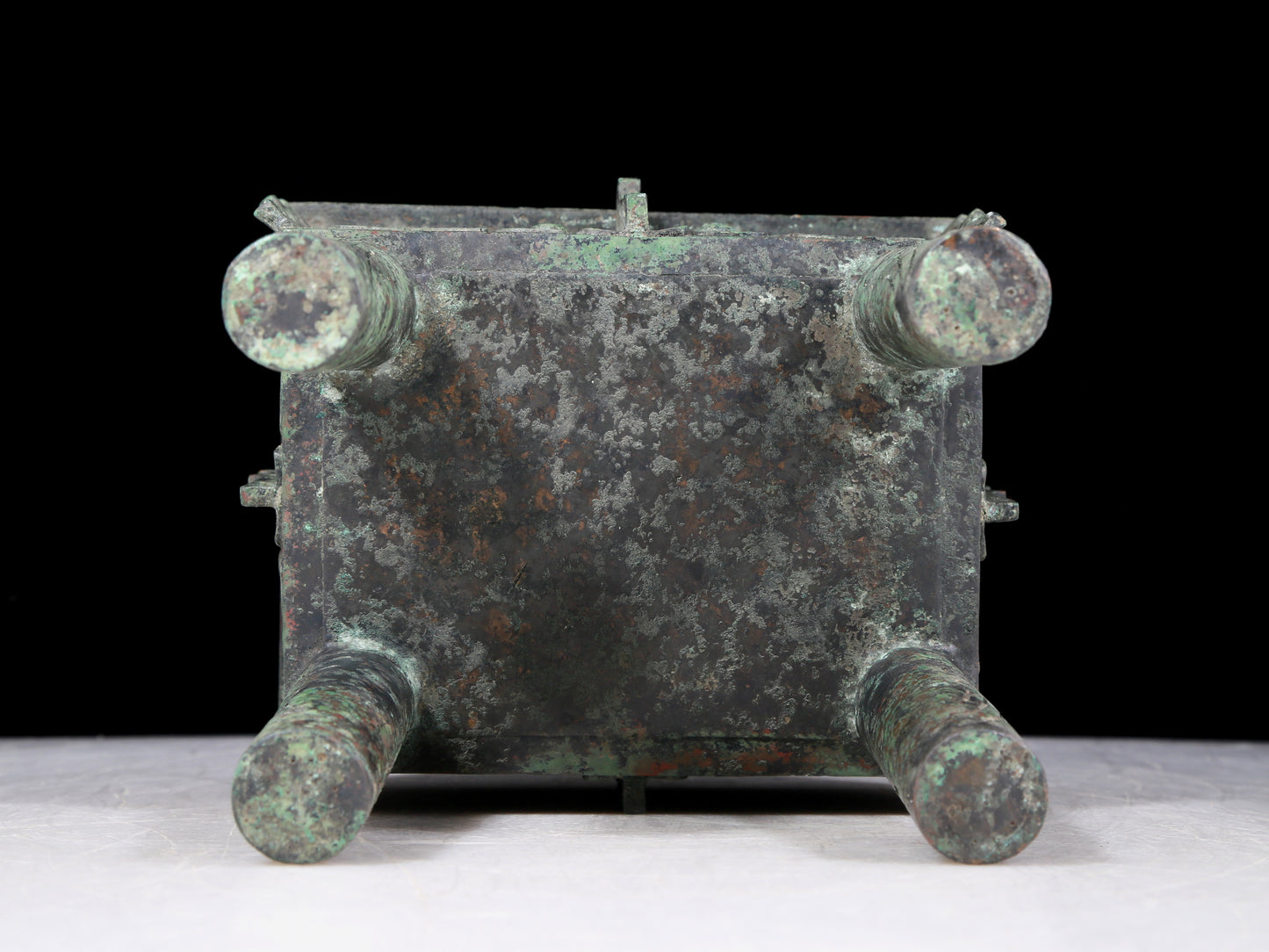 A precious bronze animal-faced tripod with two ears and four legs