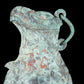 A precious bronze auspicious animal holding pot