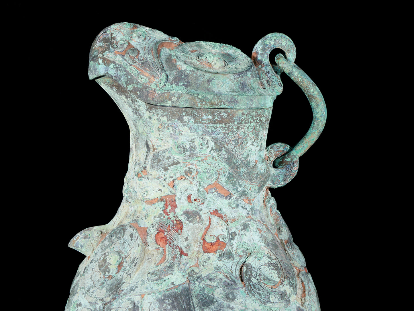 A precious bronze auspicious animal holding pot