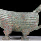 A precious bronze auspicious animal holding pot