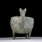 A precious bronze auspicious animal holding pot