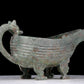 A precious bronze auspicious animal holding pot