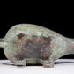 A precious bronze auspicious animal holding pot