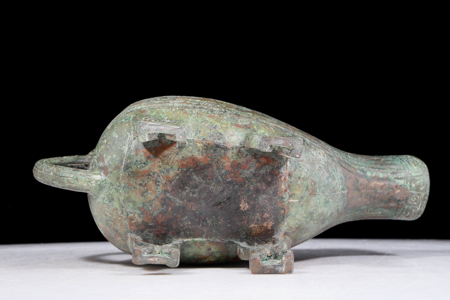 A precious bronze auspicious animal holding pot