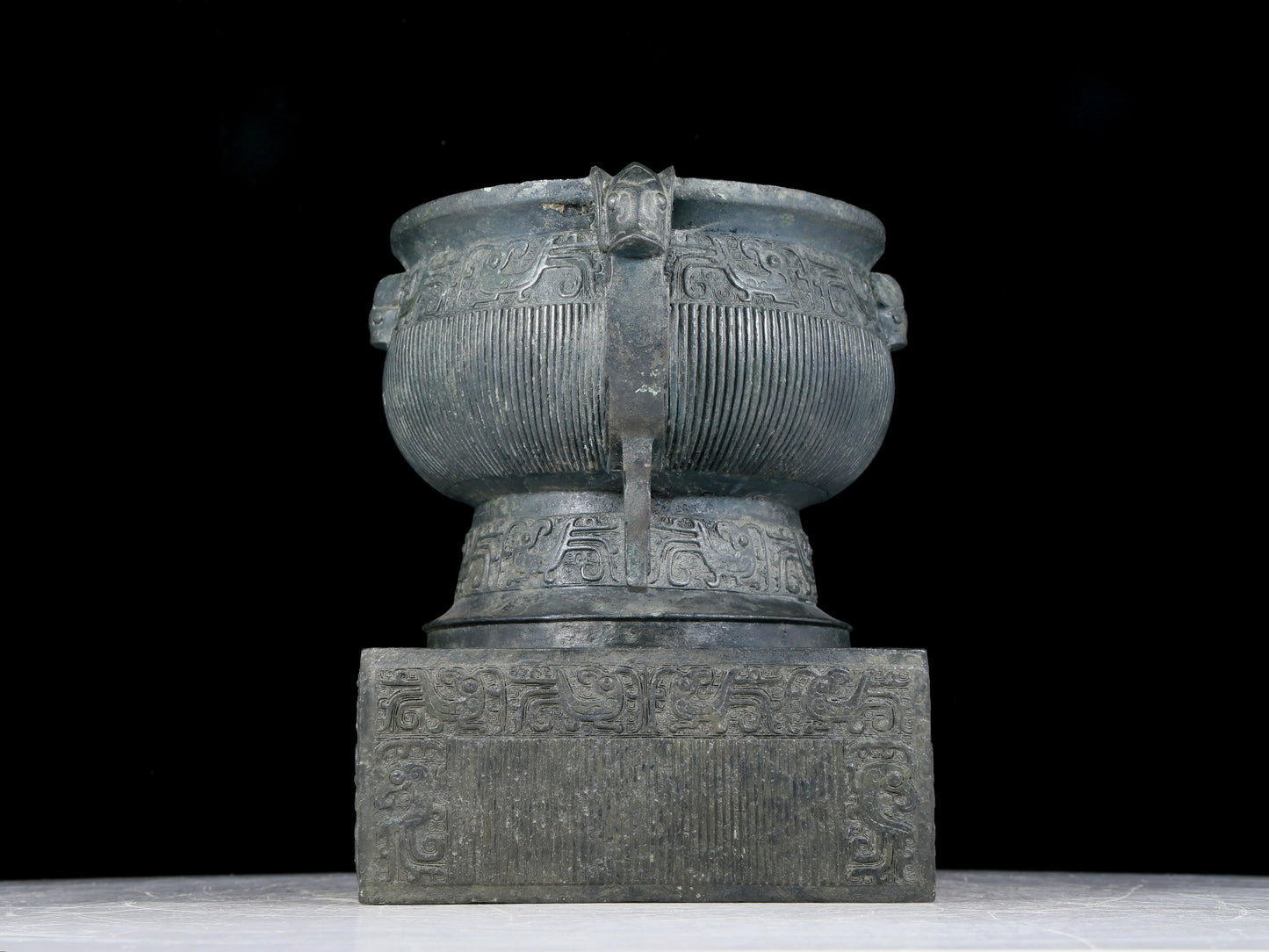 A precious bronze double-eared stove with auspicious animal patterns