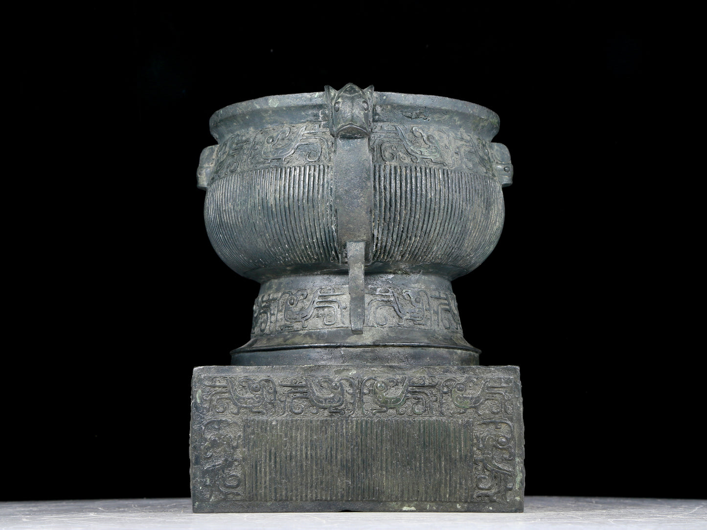 A precious bronze double-eared stove with auspicious animal patterns