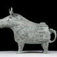 A precious bronze auspicious animal holding pot