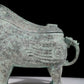 A precious bronze auspicious animal holding pot