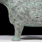 A precious bronze auspicious animal holding pot