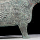 A precious bronze auspicious animal holding pot