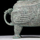 A precious bronze auspicious animal holding pot