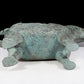 A precious bronze auspicious animal holding pot