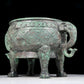 A rare bronze animal-mask elephant-ear censer