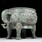 A rare bronze animal-mask elephant-ear censer