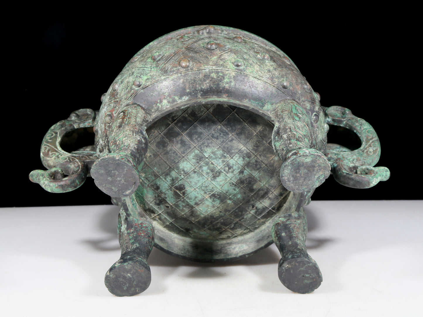 A rare bronze animal-mask elephant-ear censer