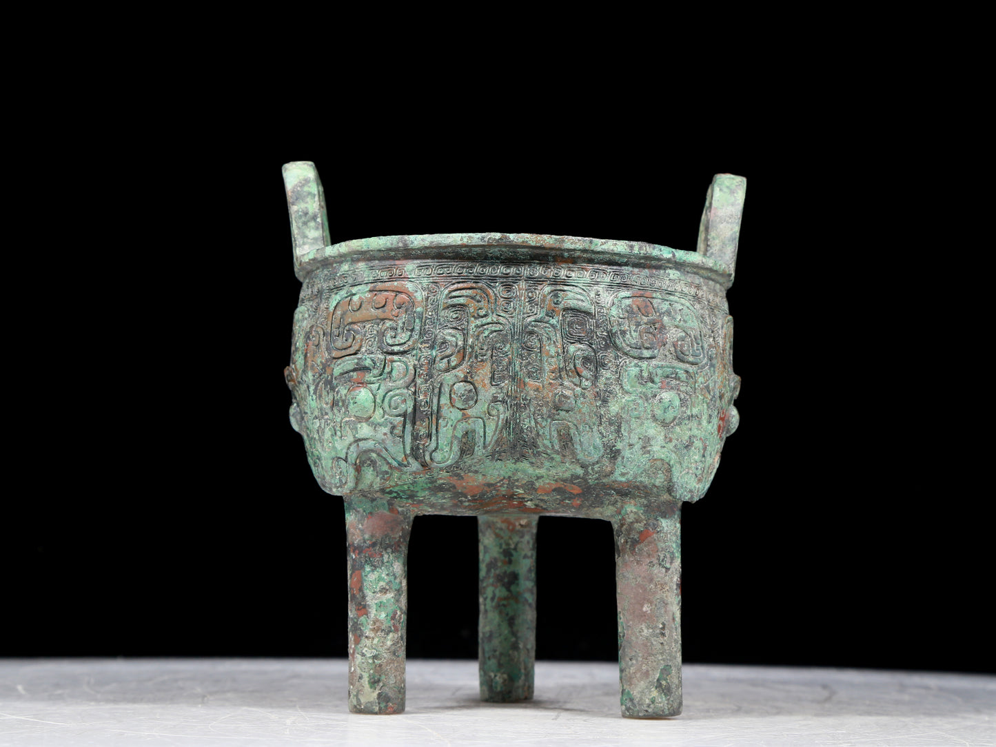 A precious bronze animal-faced two-eared and tripod censer