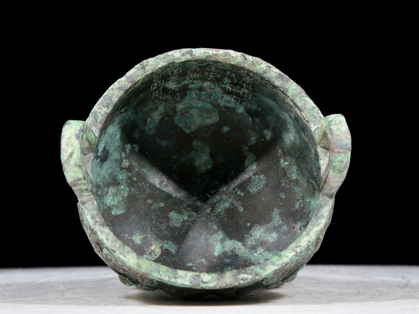 A precious bronze animal-faced two-eared and tripod censer