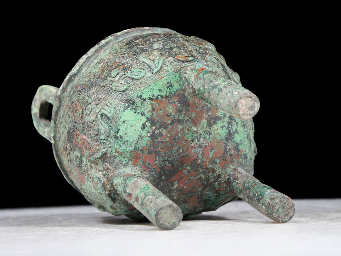 A precious bronze animal-faced two-eared and tripod censer