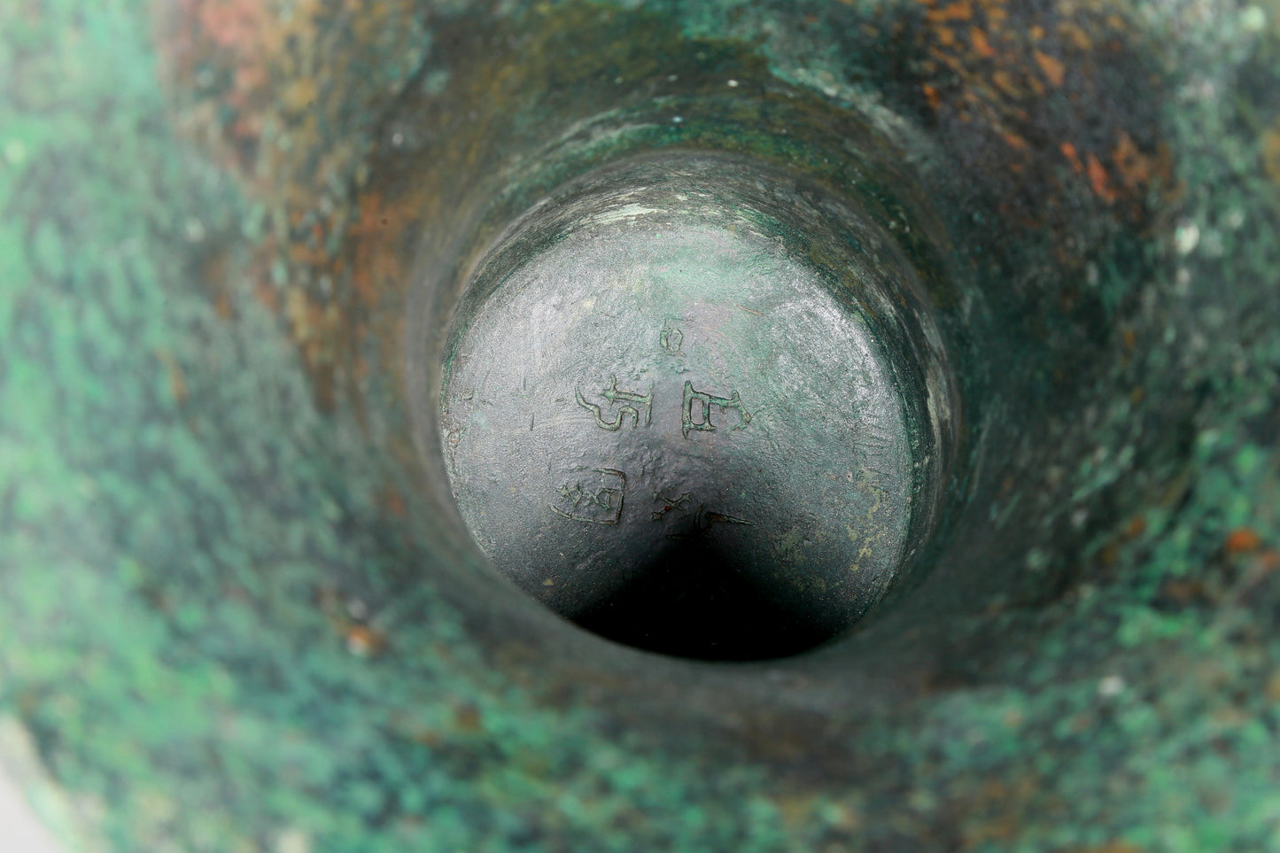 A precious bronze animal mask bottle