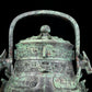 A precious bronze animal-faced pot