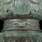 A precious bronze double-eared stove with animal masks