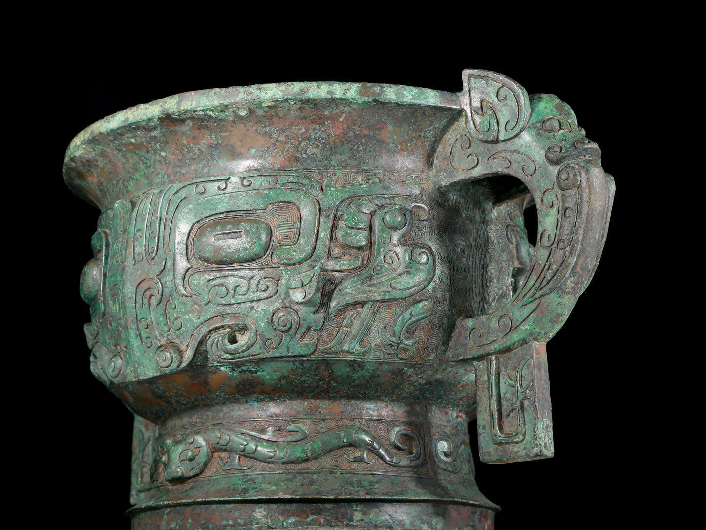 A precious bronze double-eared stove with animal masks