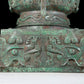 A precious bronze double-eared stove with animal masks