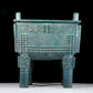 A precious bronze tripod with two ears and four legs with auspicious animal patterns