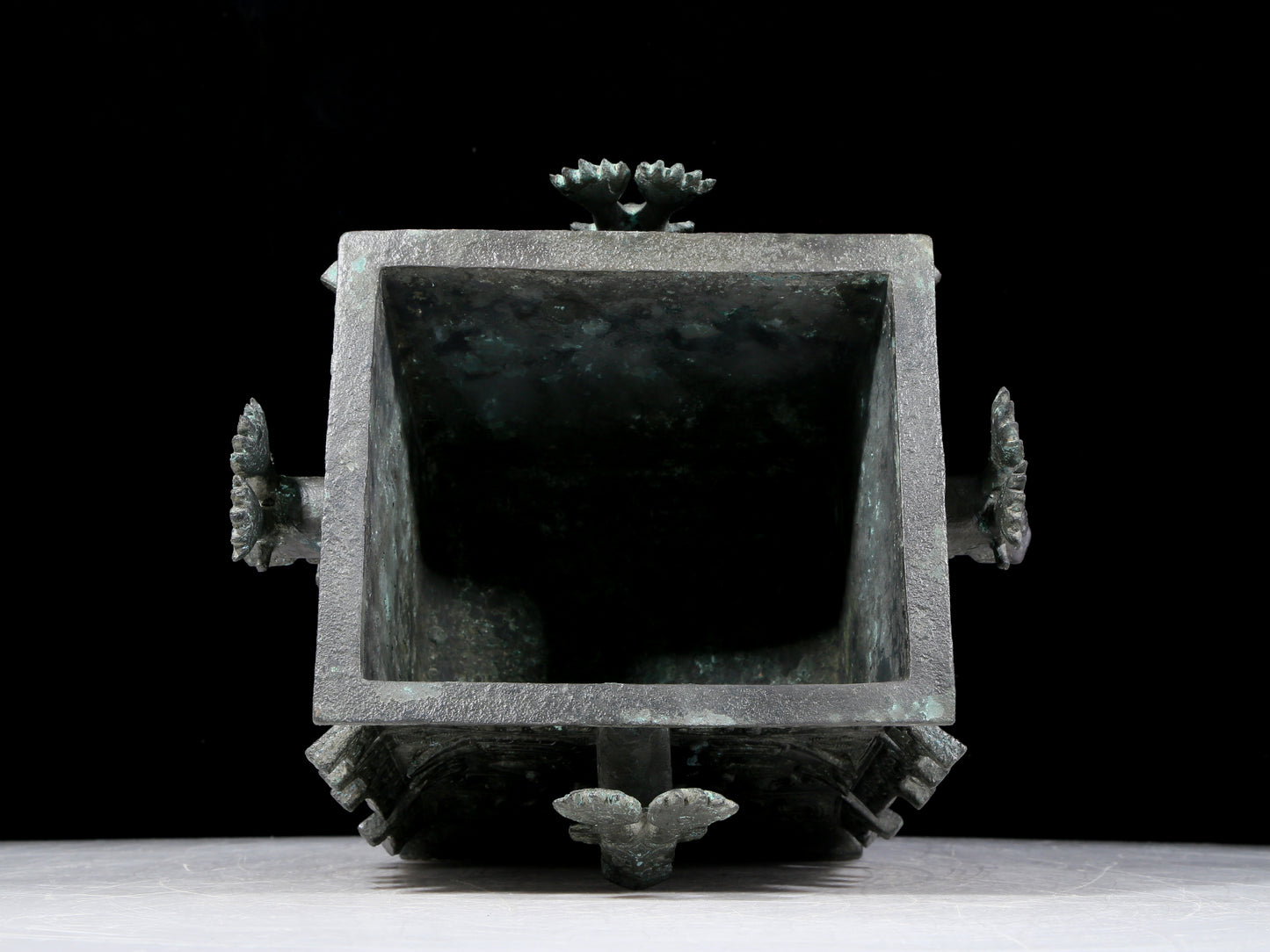 A precious bronze animal mask jar with lid