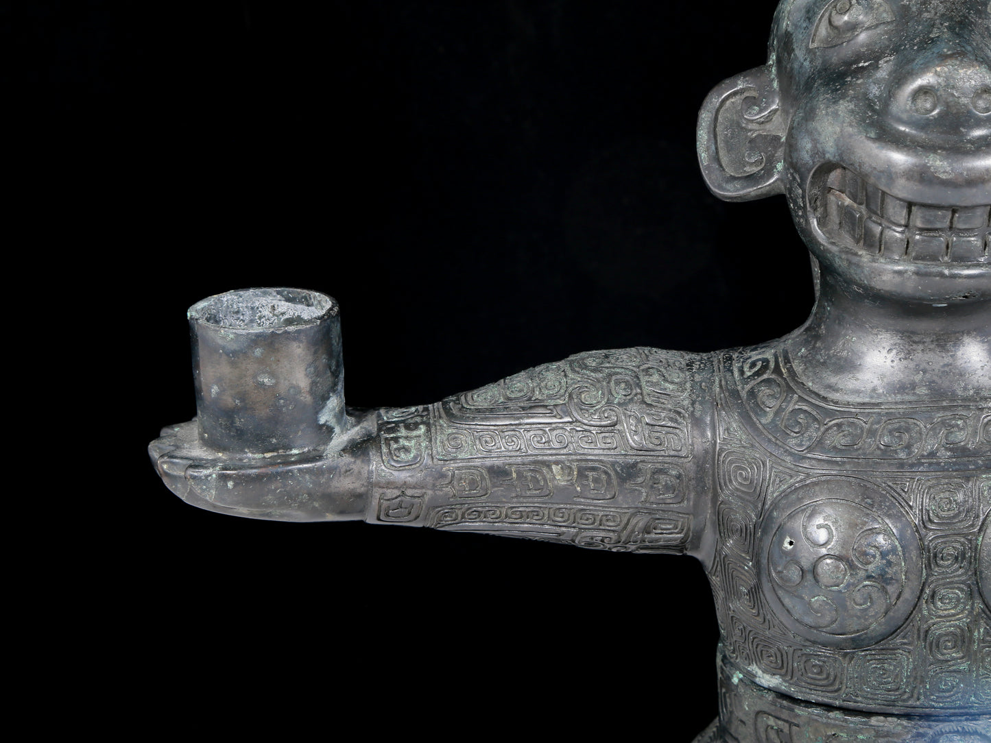 A precious bronze figure candlestick