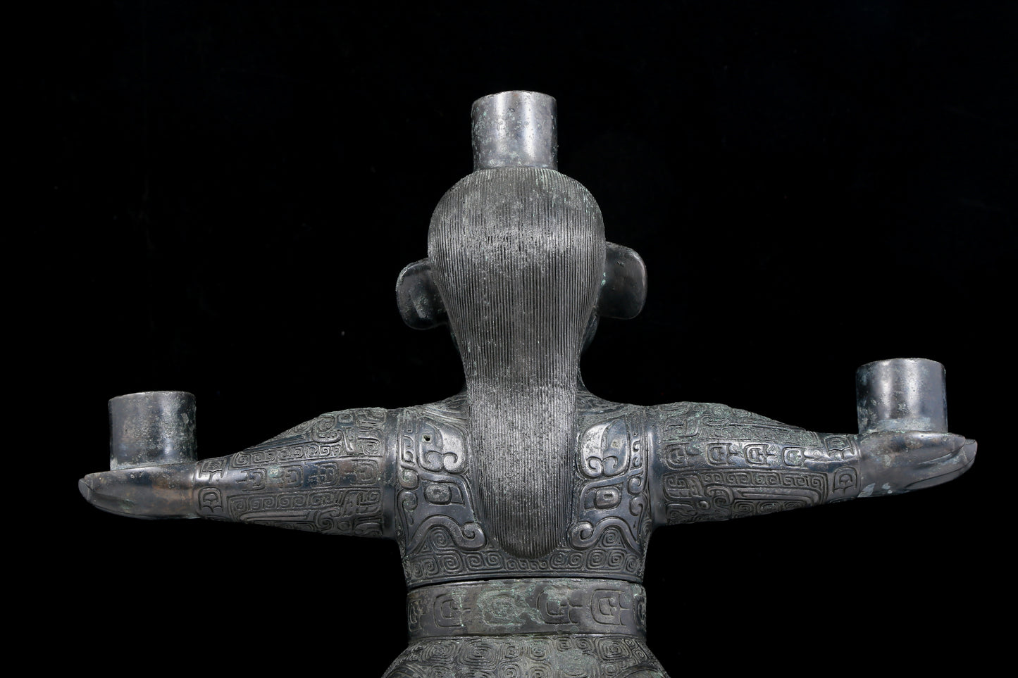 A precious bronze figure candlestick