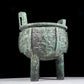 A precious bronze animal mask with two ears and three sets of censers