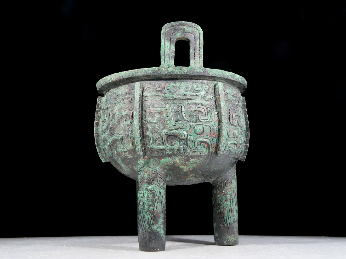 A precious bronze animal mask with two ears and three sets of censers