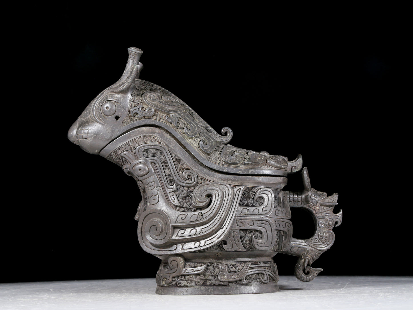 A precious bronze ewer with auspicious animal patterns