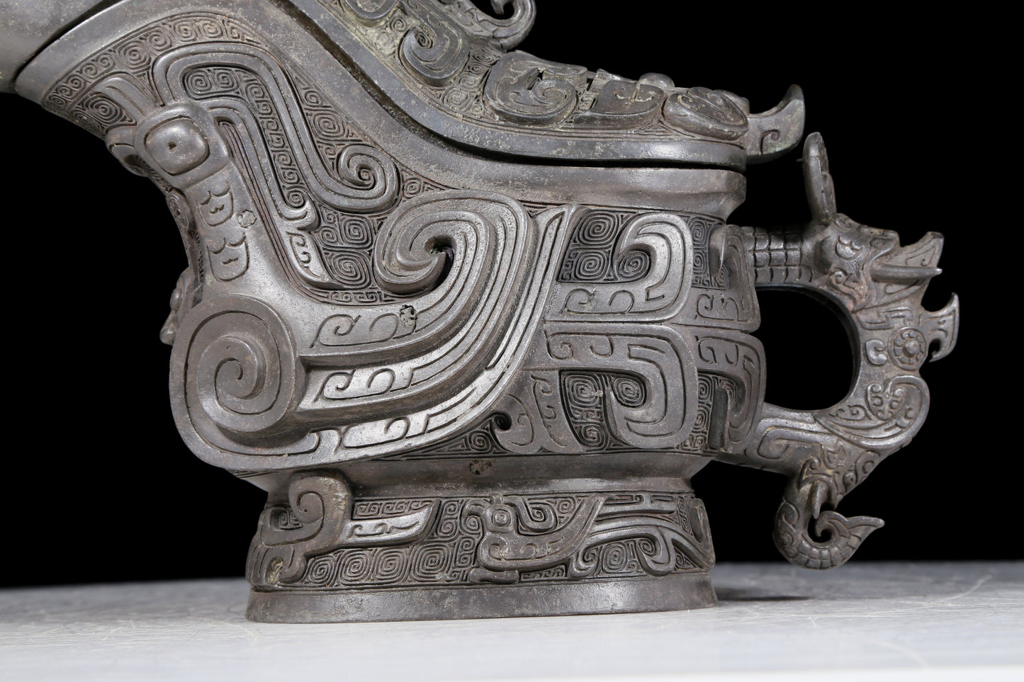 A precious bronze ewer with auspicious animal patterns