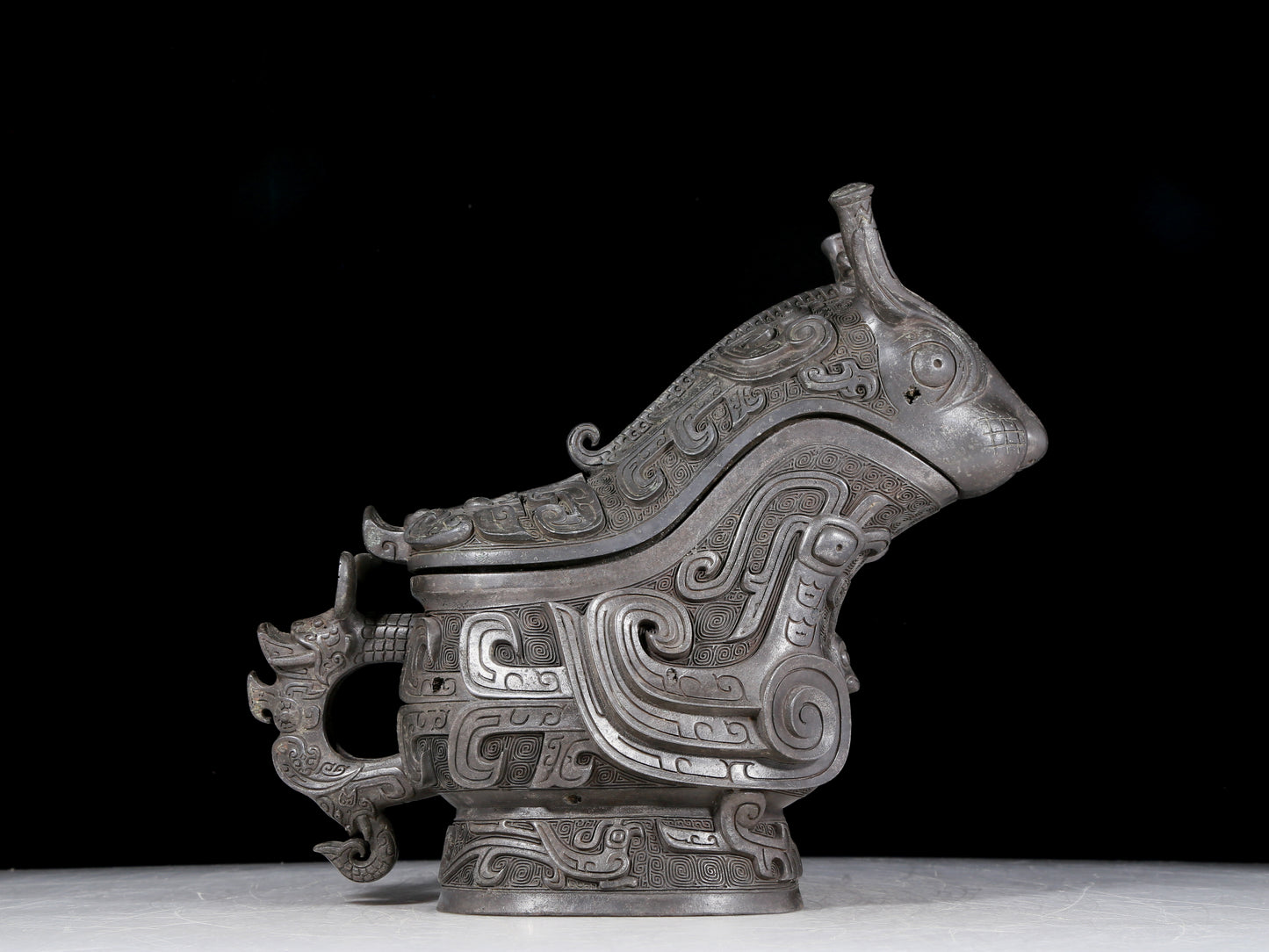 A precious bronze ewer with auspicious animal patterns