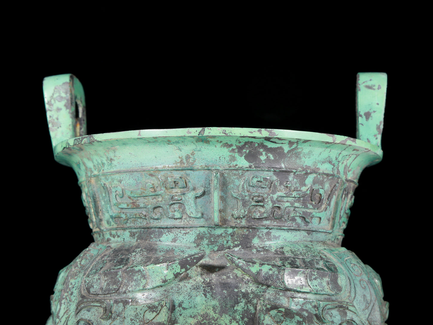 A precious bronze animal-faced two-eared and tripod censer