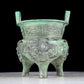 A precious bronze animal-faced two-eared and tripod censer