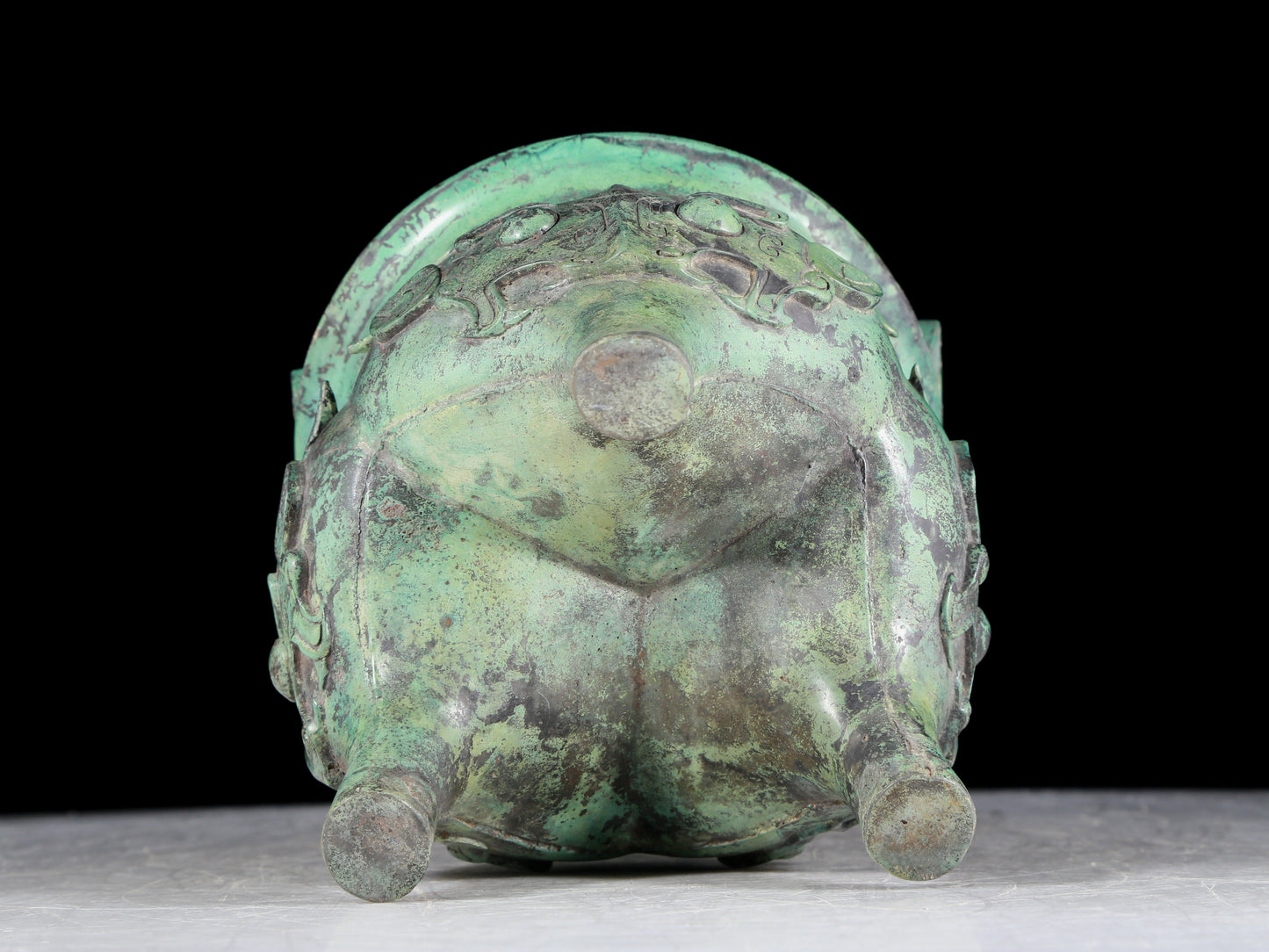 A precious bronze animal-faced two-eared and tripod censer